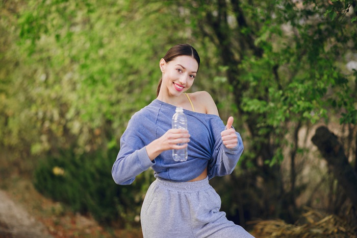 Nestle Vitality Water with girl in garden